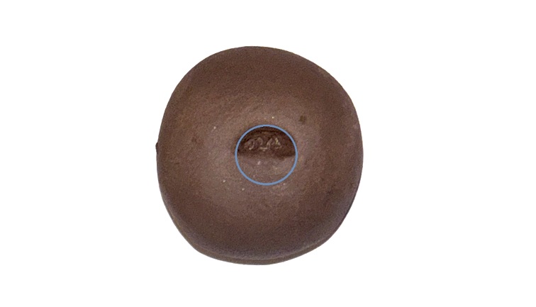 Clay ball with half a hole