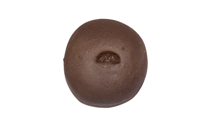 Clay ball with half a hole