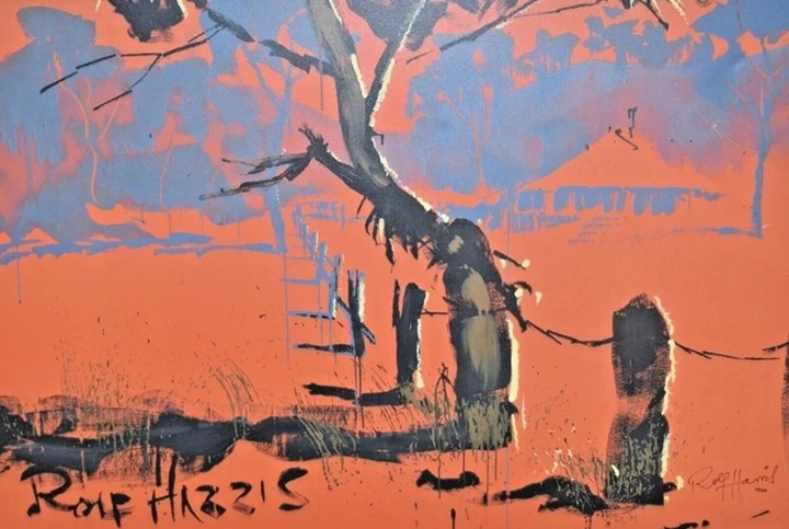 Australian outback scene. Orange with forlorn trees